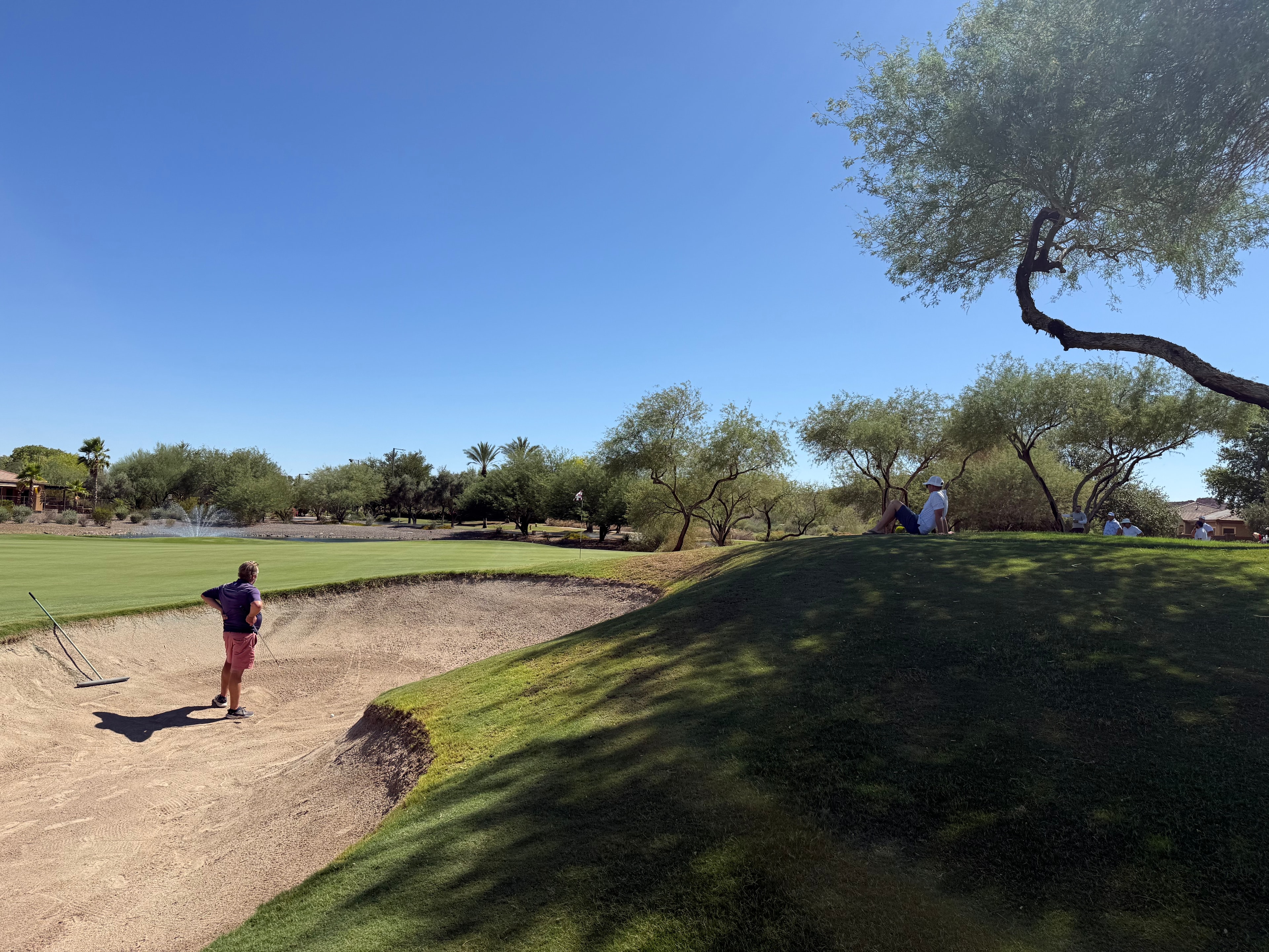 Players walking the fairway on playoff hole 2 at the Peoria Prestige